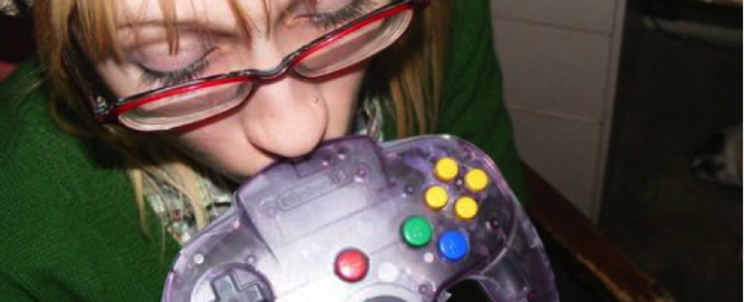 Women uses a games controller to smoke weed