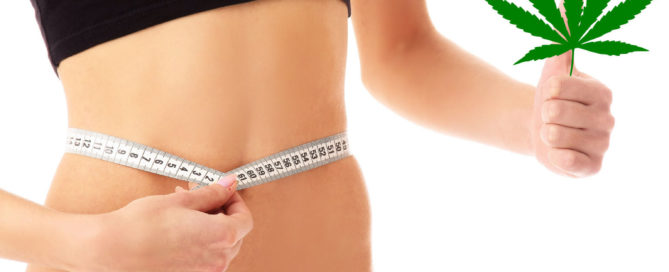 Slim woman holding tape measure and cannabis leaf